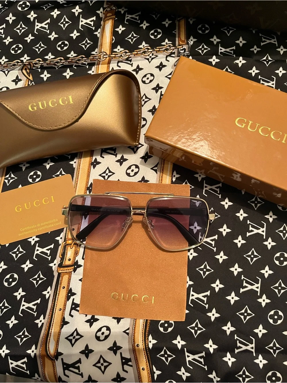 Gucci Gold Frame Sunglasses with Gradient Pink Lenses